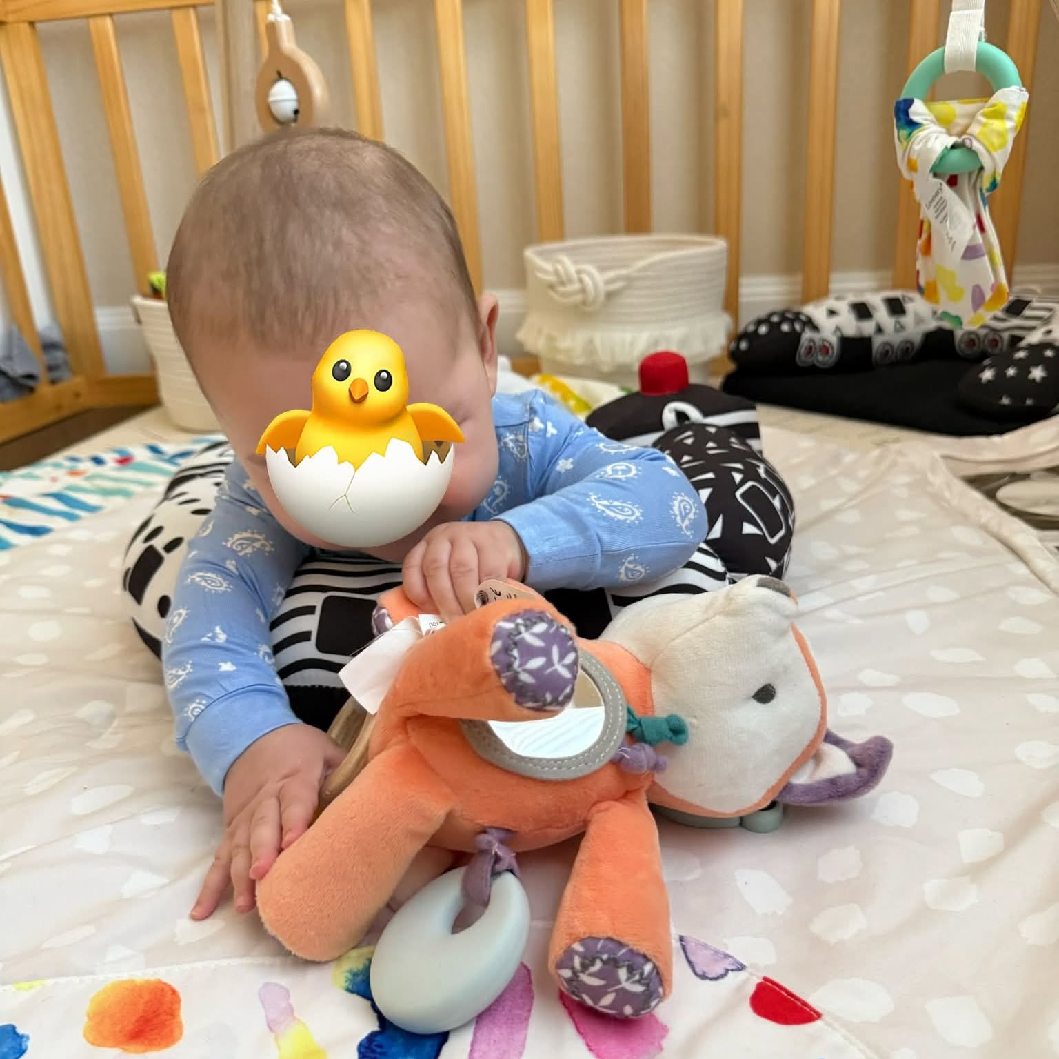 Infant tummy time with sensory toys