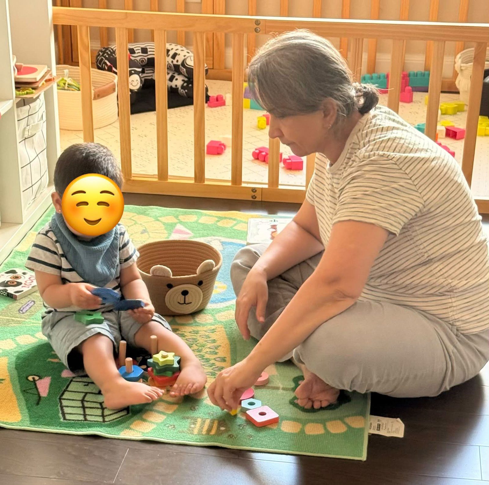 Stacking toys with a caregiver