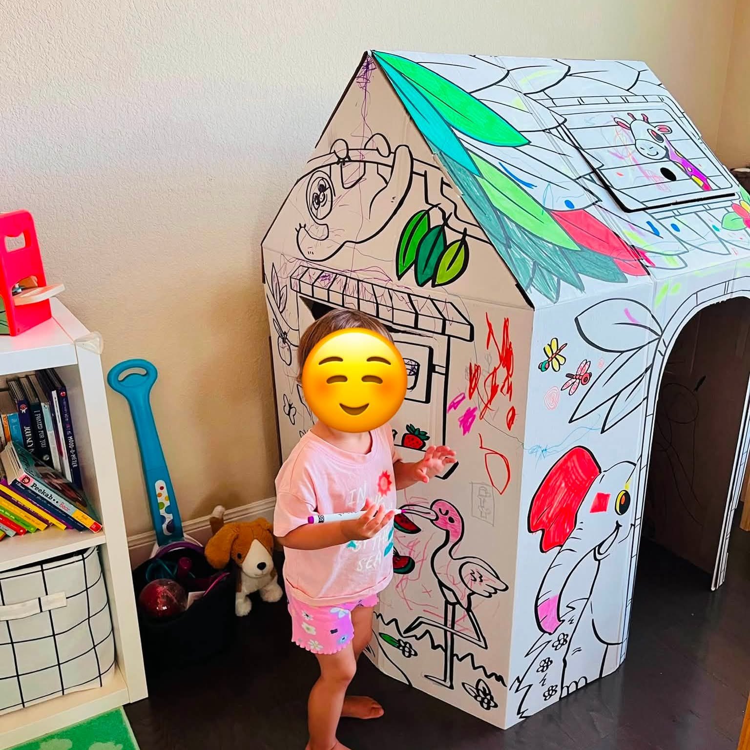 Coloring the cardboard playhouse